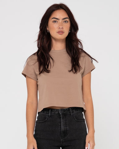 Woman wearing Blanks Baby Tee in Warm Taupe