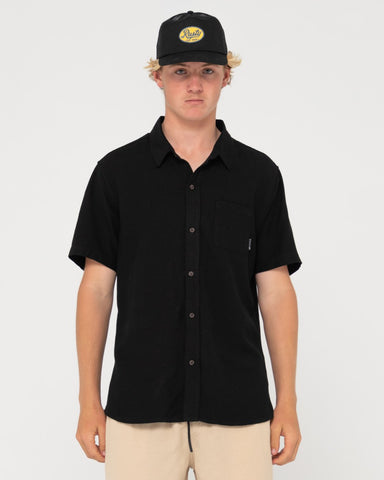 Man wearing Overtone Short Sleeve Linen Shirt in Black