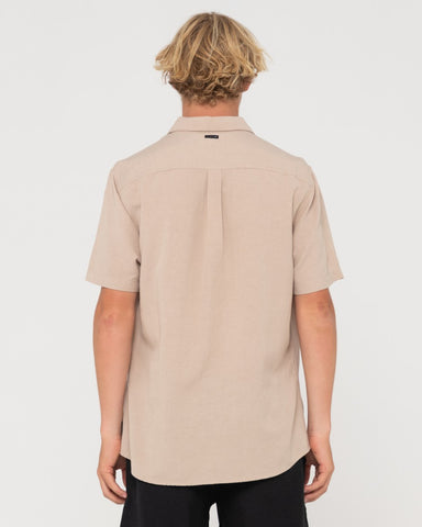 Man wearing Overtone Short Sleeve Linen Shirt in Light Khaki