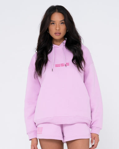 Woman wearing Choose Your Future Oversize Hoodie in Rose Bloom