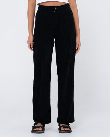 Woman wearing The Secret Cord Pant in Black