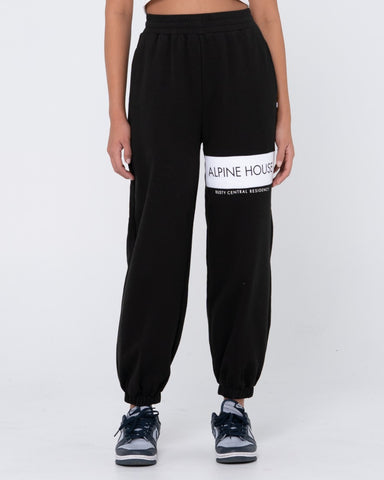 Woman wearing Alpine House Trackpant in Black