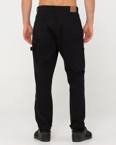 Man wearing Dungaree 5 Pkt Pant in Black