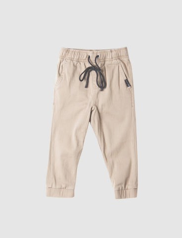 Boy wearing Hook Out Elastic Pant Runts in Vintage Khaki