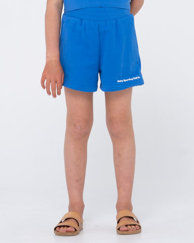 Girl wearing Rusty Sporting Club Fleece Short Girls in Dazzling Blue