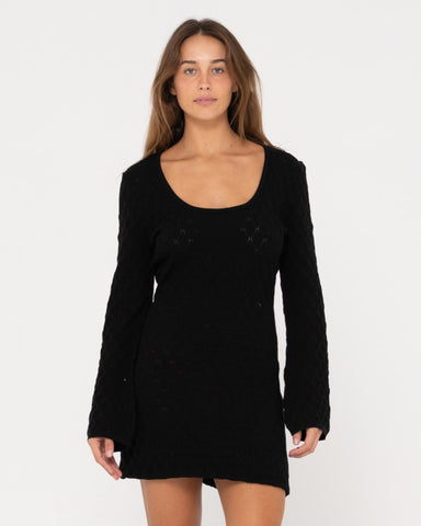 Woman wearing Leo Long Sleeve Knit Mini Dress in Black