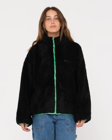 Woman wearing Ollie Sherpa Zip Through Fleece in Black
