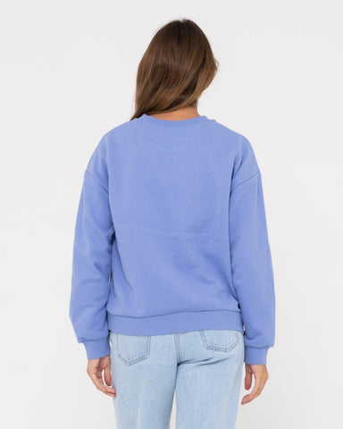 Woman wearing Thriving Relaxed Crew Fleece in Periwinkle Blue