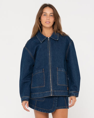 Woman wearing Ryley Oversized Zip Through Denim Jacket in Deep Blue