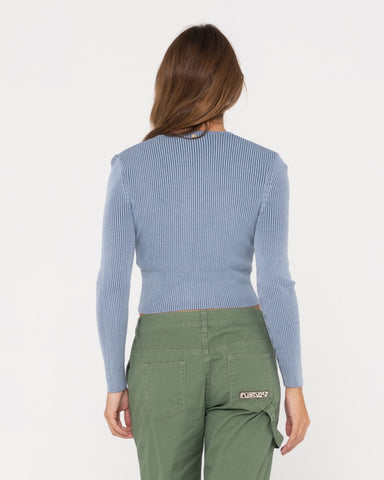 Woman wearing Solace Long Sleeve Knitted Top in Tranquil Blue