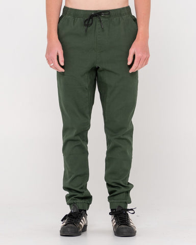 Man wearing Hook Out Elastic Pant in Shadow Army