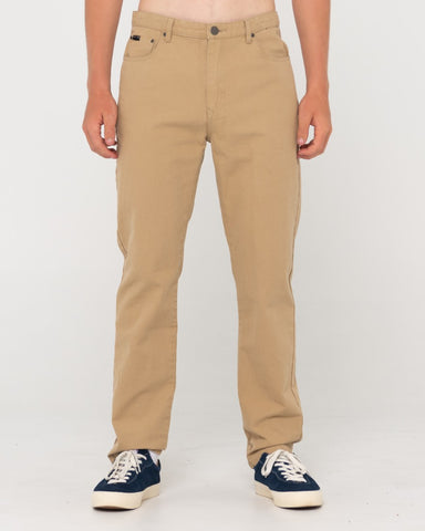 Man wearing The Bruce 5 Pkt Pant in Khaki