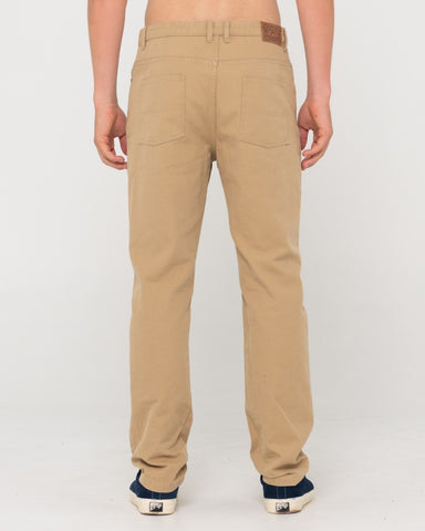 Man wearing The Bruce 5 Pkt Pant in Khaki
