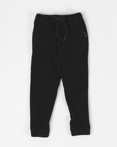 Boy wearing Hook Out Elastic Pant Runts in Black