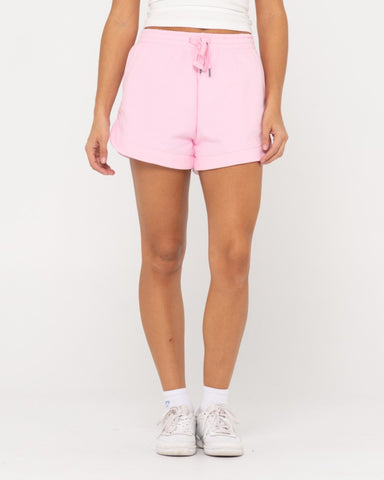 Woman wearing Rusty Signature Fleece Short in Soft Orchid