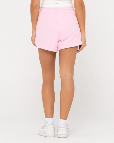 Woman wearing Rusty Signature Fleece Short in Soft Orchid