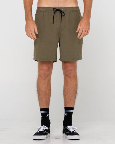 Man wearing Overtone Linen Elastic Short in Savanna