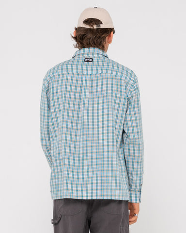 Man wearing Datsun Check Long Sleeve Shirt in Blue Fog